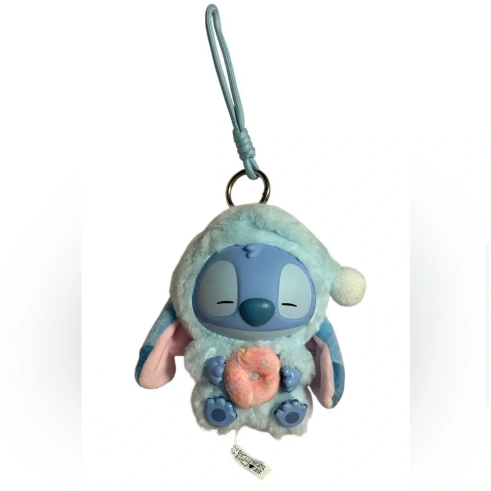 Disney MINISO Stitch Eat Something Before
Sleep Vinyl Plush KeychainSleepy Donut - Picture 6 of 9